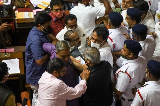 Ruckus between BJP and Congress leaders over the chairman post during the Karnataka Legislative Council in Bengaluru, Tuesday, Dec. 15, 2020. (PTI Photo)