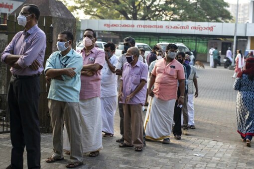 People queue up to vote for the Kerala elections. (AP)