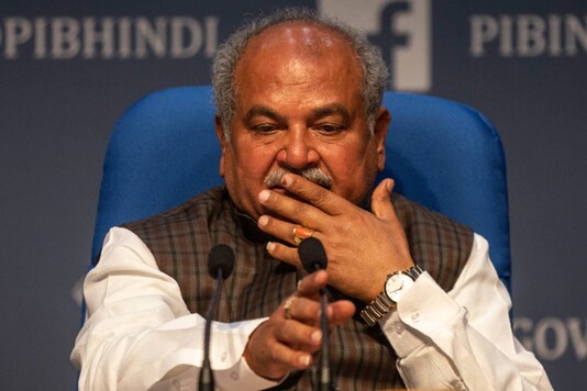 Agriculture minister Narendra Singh Tomar gestures as he addresses a press conference in New Delhi. (AP Photo/Altaf Qadri)