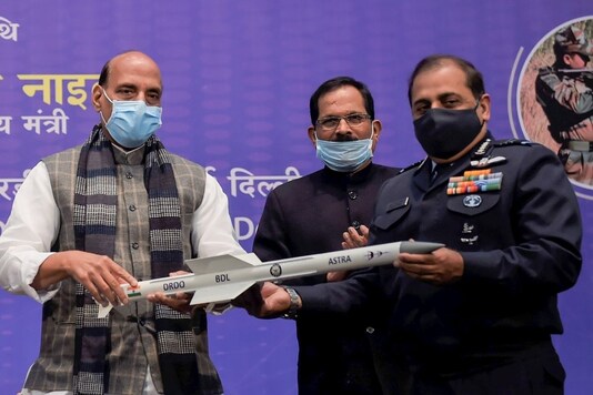 New Delhi: Defence Minister Rajnath Singh handovers a model of ASTRA Mk-I Missile to Chief of the Air Staff Air Chief Marshal Rakesh Kumar Singh Bhadauria, during the DRDO awards function, in New Delhi, Friday, Dec. 18, 2020. (PTI Photo/Kamal Singh)(
