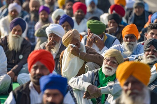 Farmers during a protest against the new farm laws, at Ghazipur border in New Delhi on December 18, 2020. (PTI Photo/Ravi Choudhary)