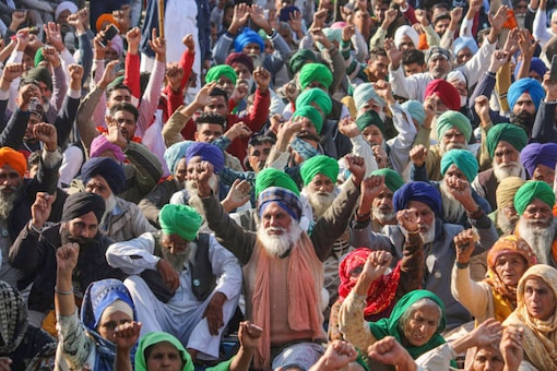 Farmers gather at Tikri border during their protest against the Centre's farm reform laws, in New Delhi on December 19, 2020. (PTI Photo)