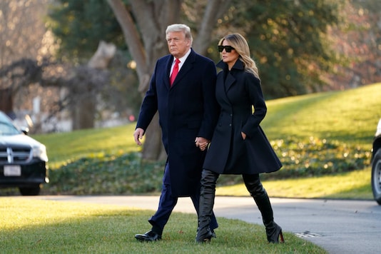 President Donald Trump and first lady Melania Trump walk to board Marine One on the South Lawn of the White House, on December 23, 2020, in Washington. (AP Photo/Evan Vucci) President Donald Trump and first lady Melania Trump walk to board Marine One on the South Lawn of the White House, on December 23, 2020, in Washington. (AP Photo/Evan Vucci)