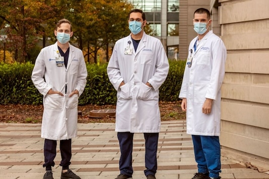From left: Drs. Jonathan Komisar, Brian Kincaid and Colin Smith of Duke University Medical Center in Durham, N.C., Nov. 27, 2020. They treated a psychotic patient who had never experienced mental health problems before contracting the coronavirus. (Jeremy M. Lange/The New York Times)
From left: Drs. Jonathan Komisar, Brian Kincaid and Colin Smith of Duke University Medical Center in Durham, N.C., Nov. 27, 2020. They treated a psychotic patient who had never experienced mental health problems before contracting the coronavirus. (Jeremy M. Lange/The New York Times)