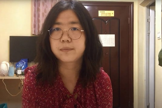 This screengrab was taken on December 28, 2020 from an undated video showing former Chinese lawyer and citizen journalist Zhang Zhan as she broadcast via YouTube, at an unconfirmed location in China. (Handout / YOUTUBE / AFP)