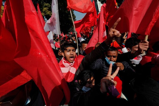 Nepalese supporters of the splinter group in the governing Nepal Communist Party participate in a protest in Kathmandu, Nepal, Tuesday, Dec 29, 2020. (Image: AP/PTI)