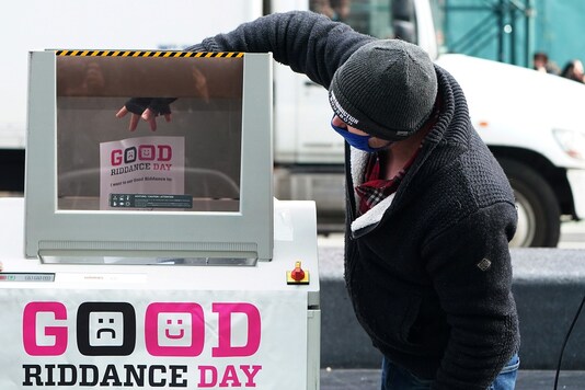 A person shreds a document containing something that they are looking forward to saying goodbye to in the year 2020 at an event in Times Square called Good Riddance Day.

REUTERS/Carlo Allegri