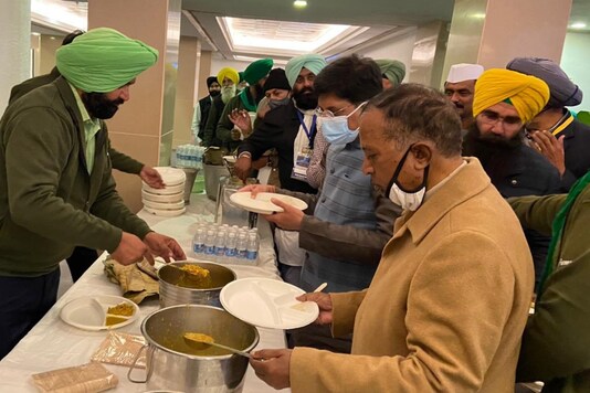 Union ministers taking food after meeting with farm leaders. Union ministers taking food after meeting with farm leaders.
