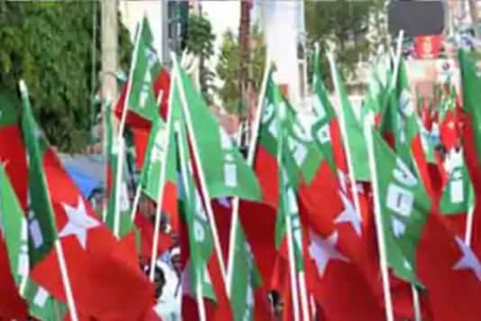 A video showing a group of people carrying flags of the Muslim outfit and raising the slogans went viral on social media following which police registered the case. A video showing a group of people carrying flags of the Muslim outfit and raising the slogans went viral on social media following which police registered the case.