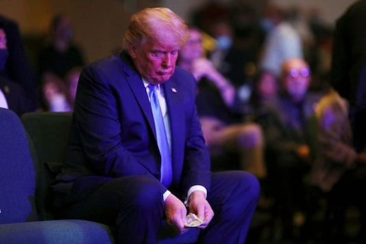 (For representation) US President Donald Trump counts money before donating it as he attends a service at the International Church of Las Vegas in Las Vegas. (REUTERS/Carlos Barria)