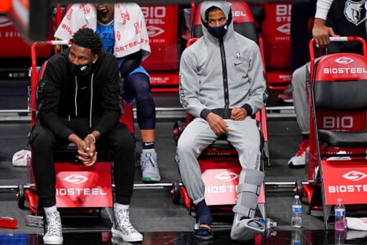 Morant Hurts Ankle But Grizzlies Top Short-handed Nets In OT Morant Hurts Ankle But Grizzlies Top Short-handed Nets In OT