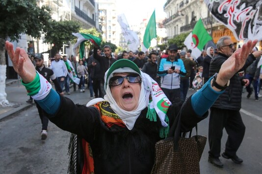 FILE PHOTO: A woman gestures during a demonstration to mark the first anniversary of protests that ousted President Abdelaziz Bouteflika, in Algiers, Algeria February 22, 2020. REUTERS/Ramzi Boudina/File Photo
