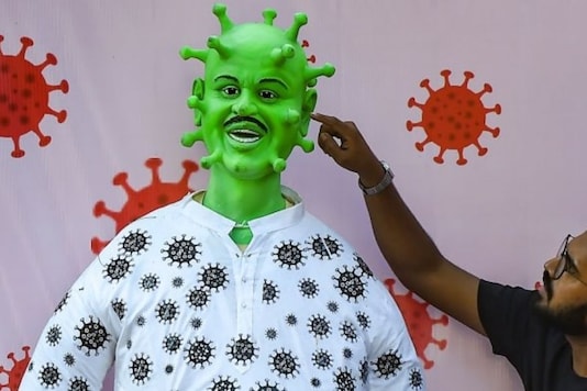 An effigy of the year 2020 depicting 'coronasur' at Worli in MumbaI. Photo: PTI An effigy of the year 2020 depicting 'coronasur' at Worli in MumbaI. Photo: PTI