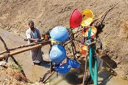 Siddappa spent just Rs. 5,000 on the construction, and gets 150 watts of power from this water mill when water flows in the canal. (Credit:VVS Laxman/Twitter) Siddappa spent just Rs. 5,000 on the construction, and gets 150 watts of power from this water mill when water flows in the canal. (Credit:VVS Laxman/Twitter)