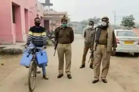 The vaccine being brought on a bicycle