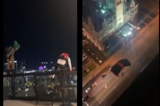 Video grab of two men parachute jumping in Nashville. 
(Credit: Twitter/@JuliaPalazzoTV
) 