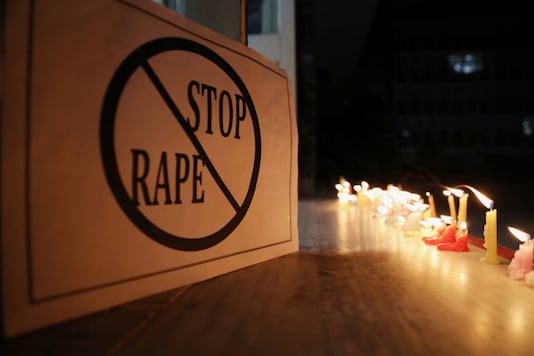 File photo of a poster seen at a candle-lit march against the spate of rape cases in India.(Reuters)
