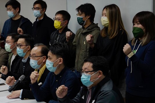 Pro-democratic party members shout slogans in response to the mass arrests during a press conference in Hong Kong Wednesday, January 6, 2021. (Image: AP)