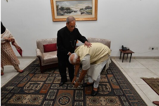 Former President Pranab Mukherjee with Prime Minister Narendra Modi. 