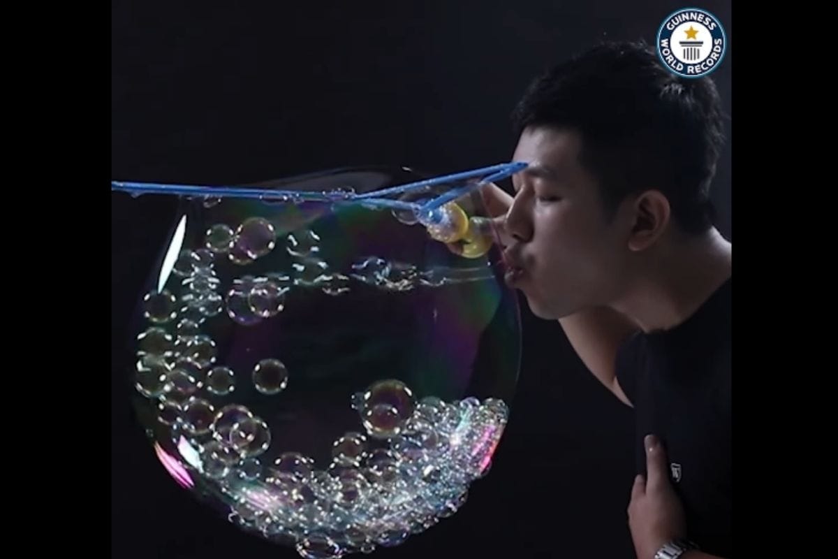 Watch: Man Sets World Record for Blowing over 700 Small Bubbles inside a Big One