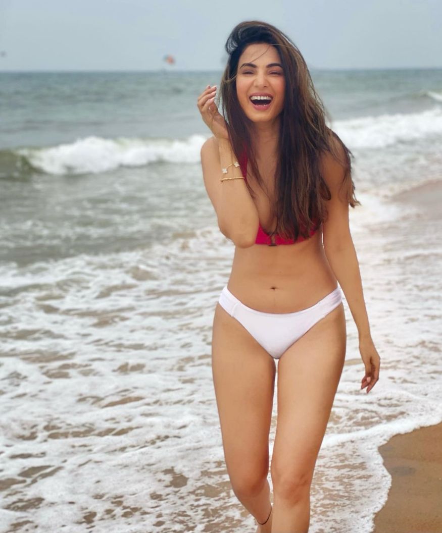 Sonal Chauhan Aces Her Vacation Style In Bikini Crochet Dress And Hot Pants Photogallery 