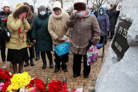 People attend a commemorative ceremony, which marks the first anniversary of the Ukraine International Airlines flight PS752 downing in Iranian airspace, in Kyiv, Ukraine January 8, 2021. REUTERS/Valentyn Ogirenko
People attend a commemorative ceremony, which marks the first anniversary of the Ukraine International Airlines flight PS752 downing in Iranian airspace, in Kyiv, Ukraine January 8, 2021. REUTERS/Valentyn Ogirenko