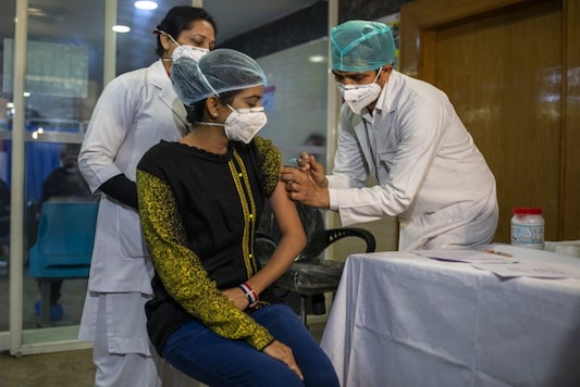File Photo Of COVID-19 Vaccination Process (Image: AP) File Photo Of COVID-19 Vaccination Process (Image: AP)