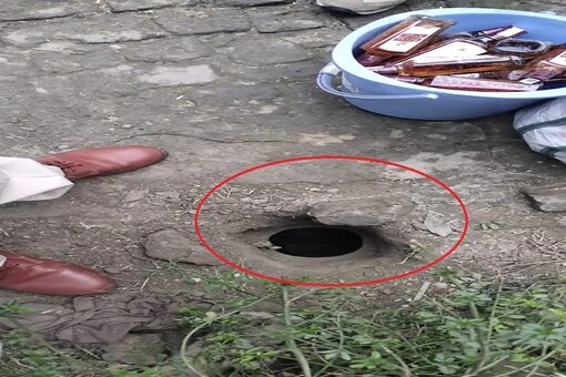An ingenious liquor smuggler in Bihar's Gopalganj district tried to ward off queries from excise officials by telling them that a hole at his village home was dug by a rat. (Credit: IANS)