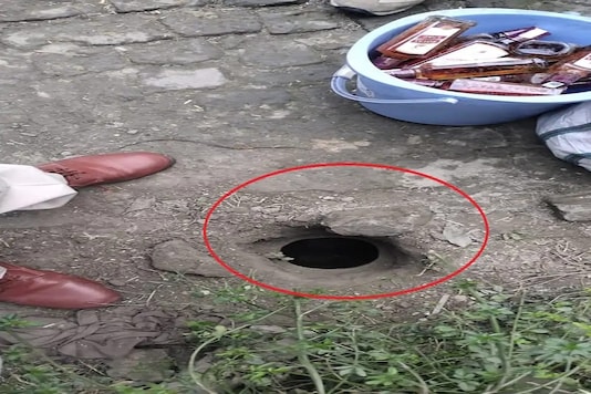 An ingenious liquor smuggler in Bihar's Gopalganj district tried to ward off queries from excise officials by telling them that a hole at his village home was dug by a rat. (Credit: IANS) An ingenious liquor smuggler in Bihar's Gopalganj district tried to ward off queries from excise officials by telling them that a hole at his village home was dug by a rat. (Credit: IANS)