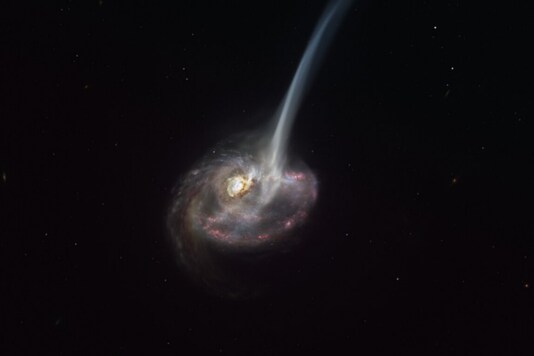 In a First, Astronomers Stumble Upon a Dying Galaxy Ejecting its Gas ...