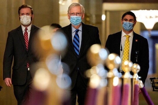 Senate Majority Leader Mitch McConnell (R-KY) walks to the Senate Chamber before a cloture vote on overriding the veto on the National Defense Authorization Act on Capitol Hill in Washington, US. (Reuters)