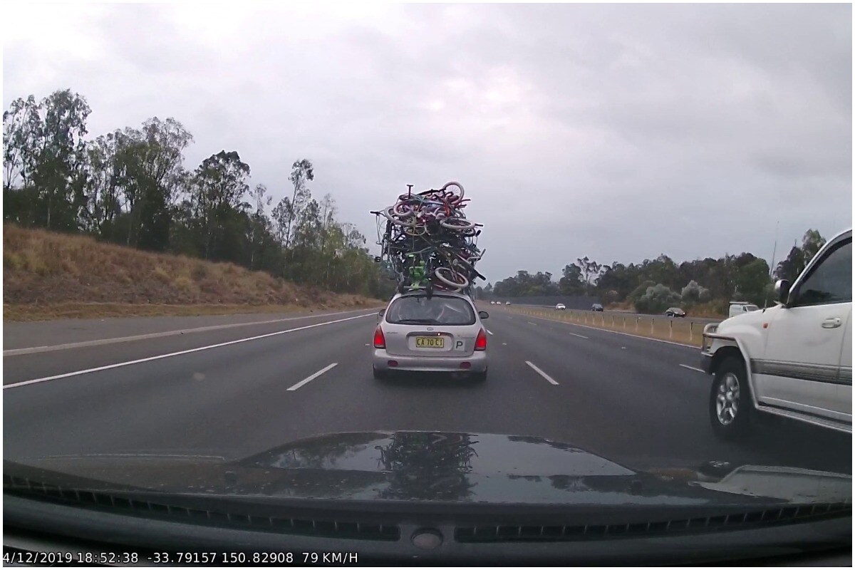 Car Busted for Carrying a 'Mountain' of Bicycles on Top in Australia after Viral Photo
