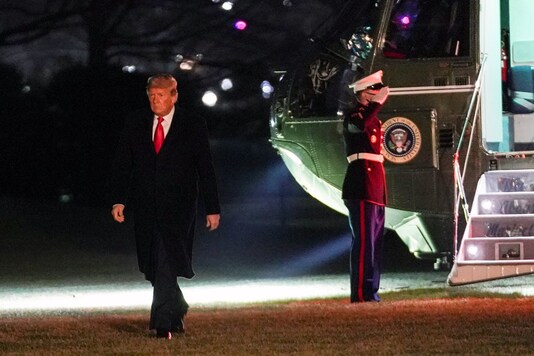 US President Donald Trump walks from Marine One upon his return to the White House in Washington, US, January 12, 2021.  (Image: Reuters)