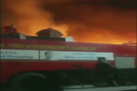 Blasts were heard in the slum which police suspect to be of gas cylinders at the houses on fire, officials said. (Image: ANI)