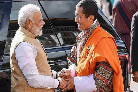 File photo of Bhutan PM Lotay Tshering (right) with his Indian counterpart Narendra Modi (left). 