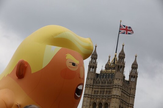 A giant inflatable blimp depicting Donald Trump as a pouting baby floats during an anti-Trump protest in London, Britain, June 4, 2019. REUTERS/Alkis Konstantinidis TPX IMAGES OF THE DAY