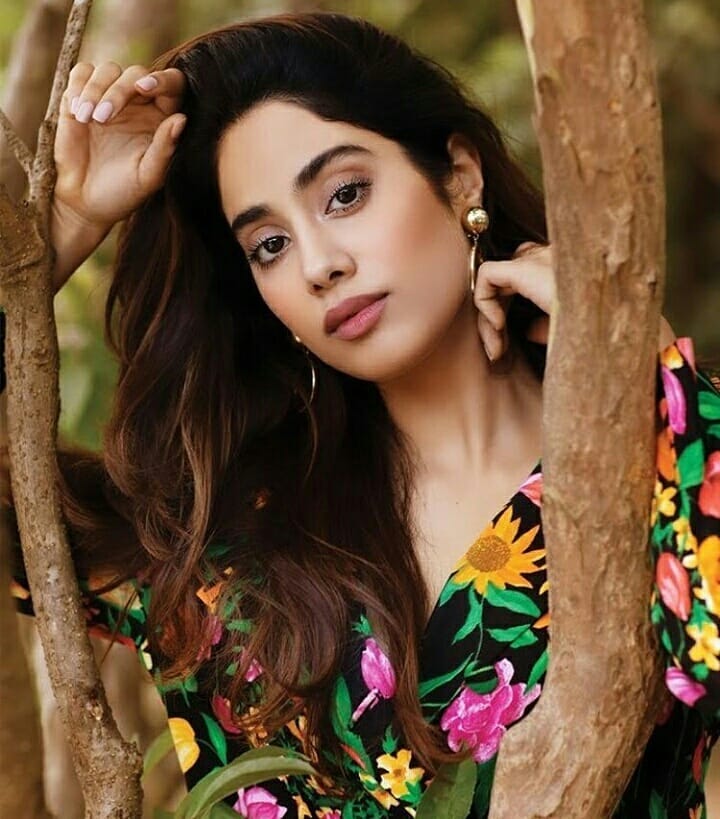  Janhvi paints a pretty picture in a floral top and hoop earrings. (Image: Instagram)