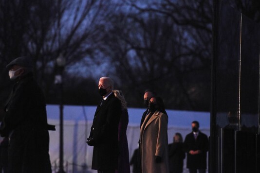 President-elect Joe Biden hosts a memorial to honor those who died from coronavirus disease (COVID-19) at the reflecting pool at the Lincoln Memorial, in Washington, U.S., January 19, 2021. REUTERS/Callaghan O'Hare
