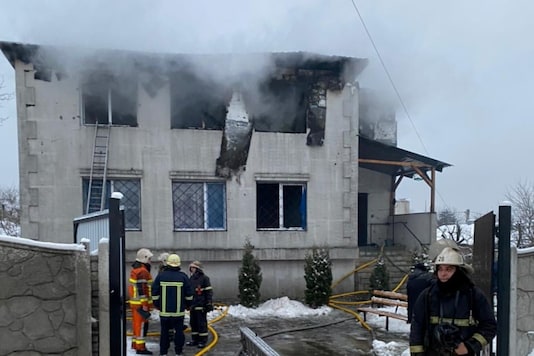 Rescuers work at the scene of the accident following a fire in nursing home in Kharkiv, Ukraine January 21, 2021. State Emergency Service of Ukraine/Handout via REUTERS Rescuers work at the scene of the accident following a fire in nursing home in Kharkiv, Ukraine January 21, 2021. State Emergency Service of Ukraine/Handout via REUTERS