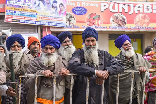 Farmers at Singhu border during their ongoing agitation against the new farm laws, in New Delhi, Friday, Jan. 22, 2021. (PTI Photo)