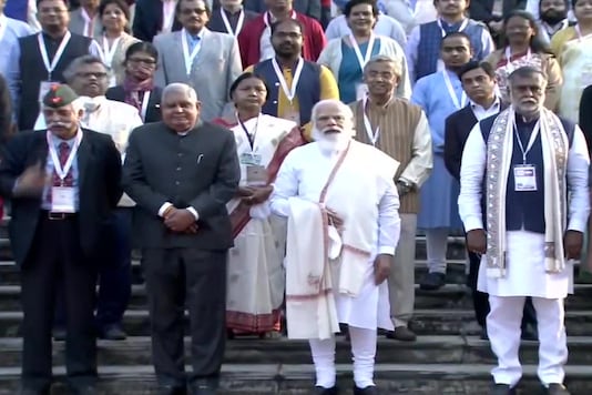 File pic of PM Narendra Modi with artists and delegates at National Library in Kolkata. (ANI Photo)