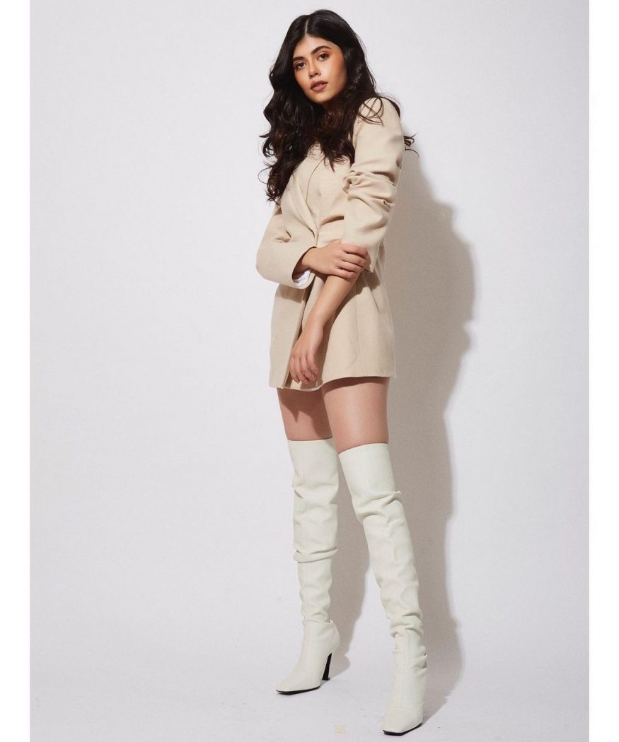  She was her chic self in this nude blazer and white thigh-high boots. (Image: Instagram)