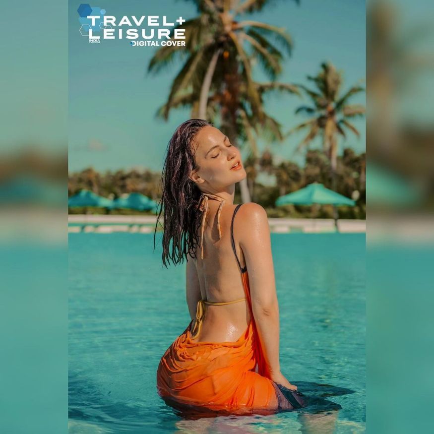 In the pictures, Elli is seen splashing her enviable body from the pool in a backless dress. (Image: Instagram) In the pictures, Elli is seen splashing her enviable body from the pool in a backless dress. (Image: Instagram)