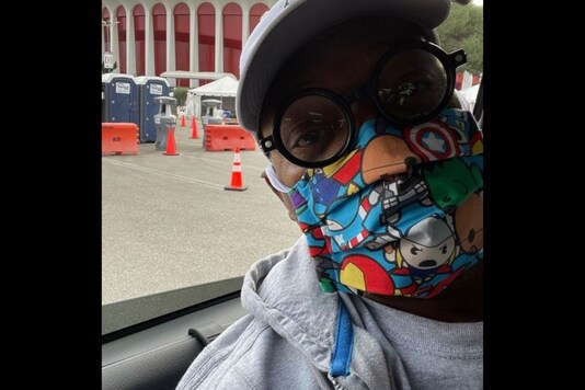  Samuel posted a selfie donning a colourful face mask with animated Avengers characters Thor while waiting to get his Covid jab. (Credit: Instagram)