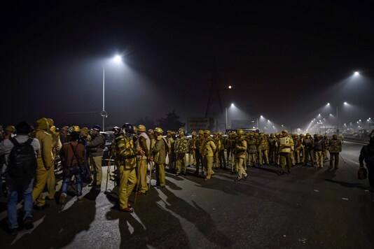 Heavy police deployment near the site of farmers' protest at Ghazipur border in New Delhi on Thursday. (PTI)