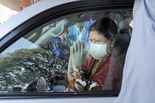 File photo of expelled AIADMK leader VK Sasikala greeting her supporters after she got discharged from a hospital, in Bengaluru.
