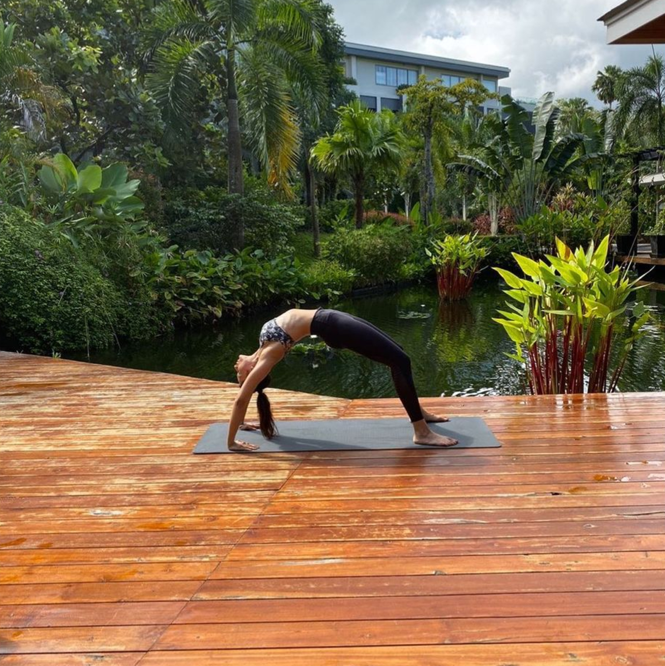 She often performs Yoga out in the open or on the pool side. (Credit: Instagram)