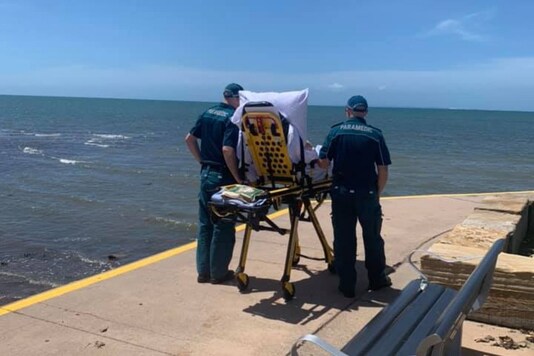 Paramedics take patient to enjoy ocean view one last time in Australia.
(Credit: Facebook)