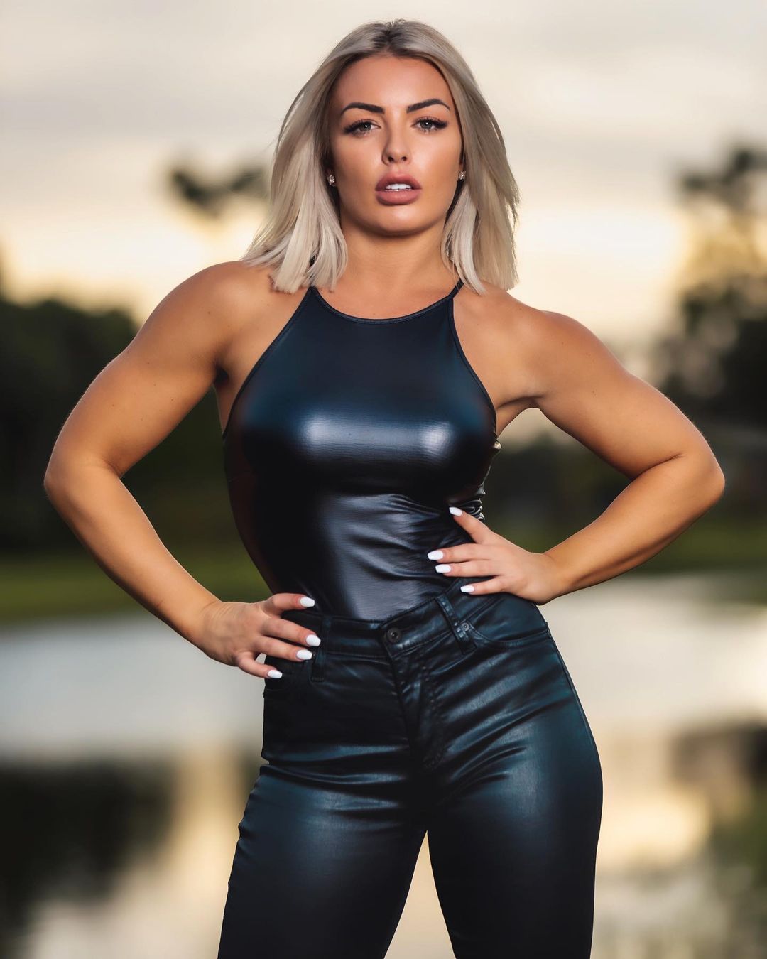  When you’re 5-foot-4 and can lift 225 pounds, you’re bound to turn some heads. That goes double when you look like Mandy Rose.