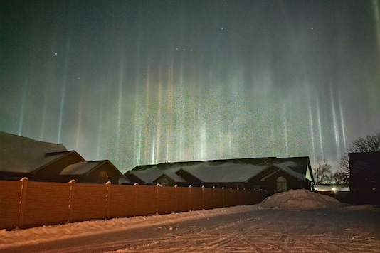 Light Pillars Formed Due To Extreme Cold In Nebraska Create Stunning Sky Pattern